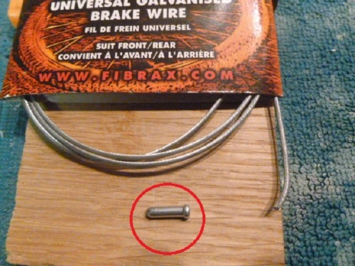 Crimp barrel used from a cycle brake cable kit to replicate second raised aperture