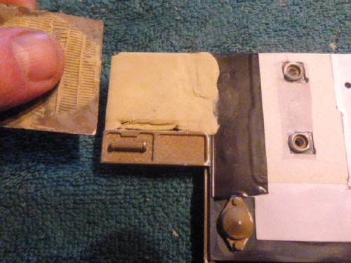When scraping the milliput with the wet soution it will remove thin layers and even it out