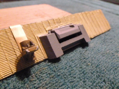 Vision Block Bonded on with 2-part epoxy glue and brass lamp plate