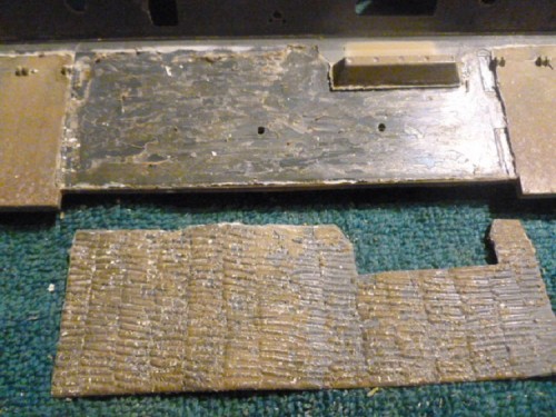 Removing the rubber imprinted zimmerit from the first build.