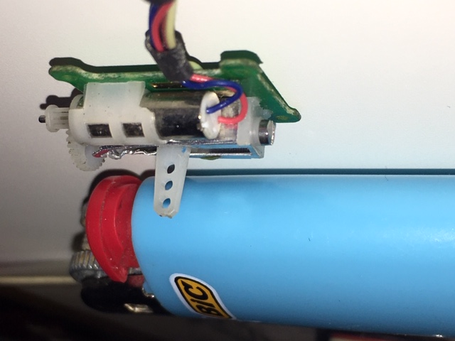 These are the smallest servos I have at this time and they are just about right for 1/35 scale model steering.