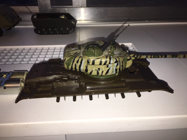 The turret from the Lindberg M46 fits the 1/35 Tamiya M60 hull so I would say that the Lindbergh Tank is 1/35.  Very weird.