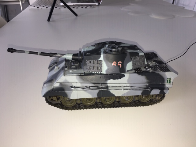 In this picture you can see the modified track sprocket and idler wheel axle mods that allow the tank to come apart for repairs if needed.