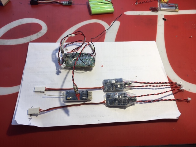 This M41 radio bay is quite small so the DSM2 setup is going to be condensed even more so that it will fit the M-41 radio bay. One way to do that is to convert the ESC battery inputs to a single connector and stack the circuit boards and secure with clear tape. I will dedicate a section later in this thread explaining how that is done and also some wiring techniques I use that are quick and effective for use in RRC work.