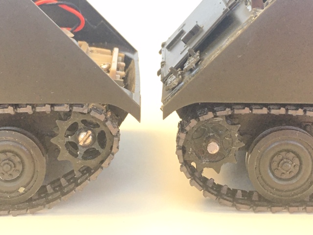 Modified static sprockets on left VS stock Tamiya motorized sprocket on right. Both of these APC's have excellent track mobility.