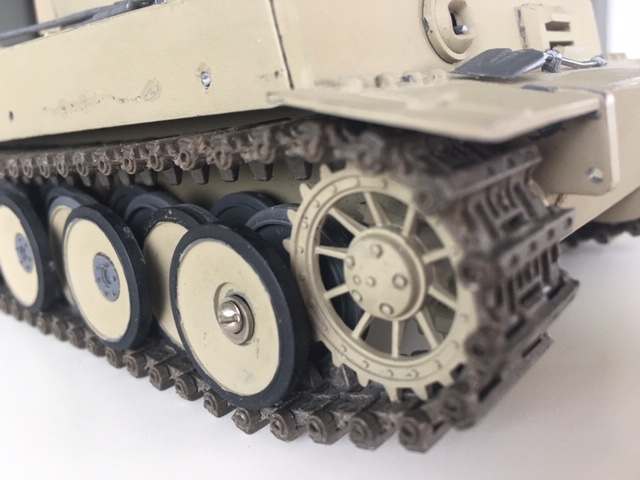 This Tank has individual linked tracks from a 1/25th scale Tamiya Centurion Tank. They have been modified. They work very well on this Tiger.