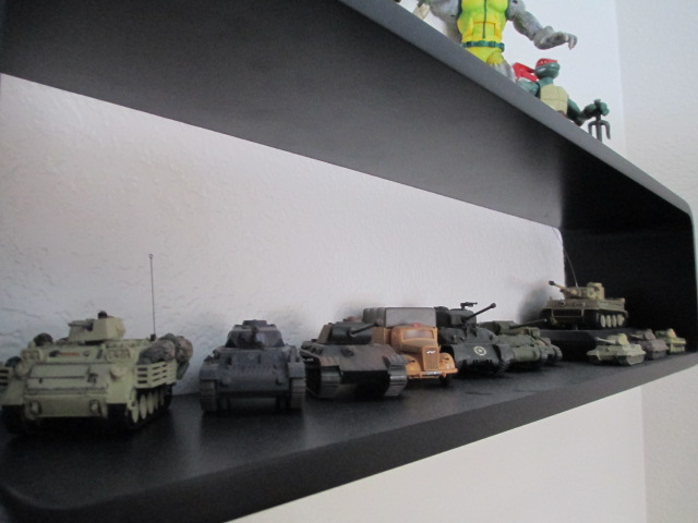 Shelf with various static 1 76 and 1 72 and 1 144 built and bought Armor along with 1 72 RC Tiger 1 and 1 144 IRC King Tiger.JPG