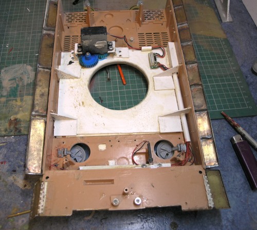 Turret ring moved and added thick styrene to stop flex. servo converted for rotation ,2 gears are easier to position The side skirts are thin brass fitted centre brace, but not needed as its thicker than the PE stuff