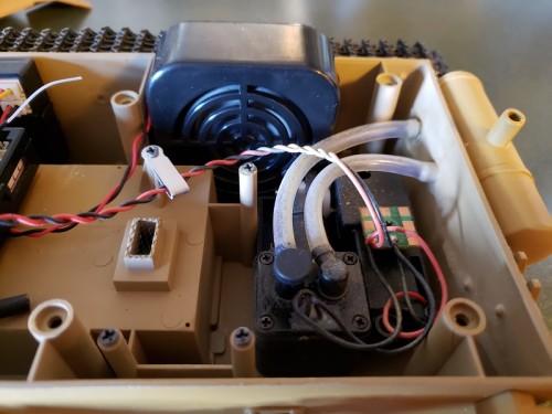 I put some mesh over the old crystal port and use it as a heat vent for the battery if it ever got warm..jpg