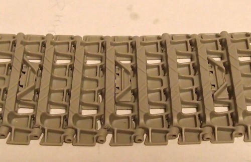 Ice cleats spaced out on tracks.