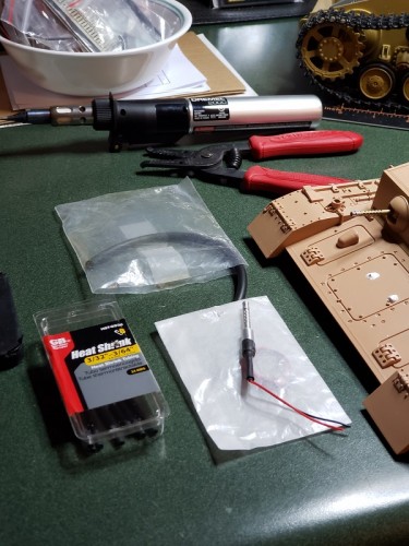 Swapping out the bow mg required a rubber stop be measured and cut to keep the Tank Modelbau MG from protruding too far out..jpg