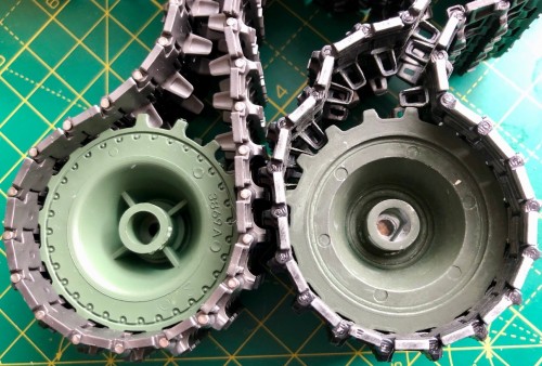 HL sprocket in Tamiya Panther track with Taigen and HL metal combo alongside.