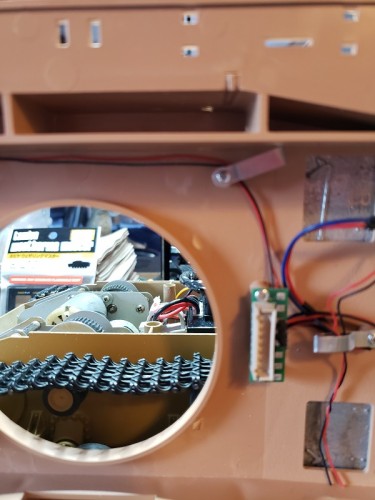 Initial drill showed that the nearby wire guide would need removal....jpg
