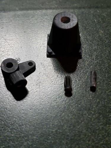 Servo Arm and PZ III Base and the snapped off pieces of the Swivel Shaft.....jpg