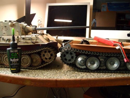 Taigen hulls , better angle compared to stock hull on tracks and higher sprocket even with no upper hull and turret on.