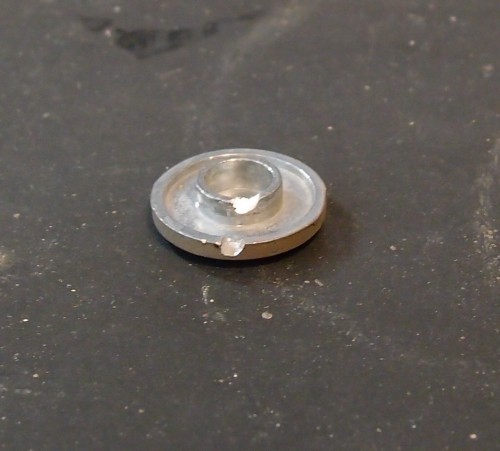 Tight fit cut a slot to flip it out if needed.