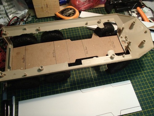 Trial layout on the remaining lower hull. More cutting to be done...