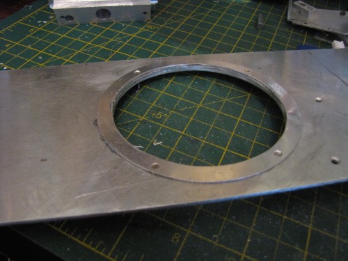 Hole and support ring for turret