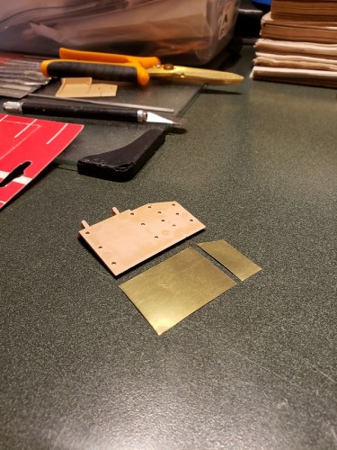 Plastic part sanded and mounts trimmed and brass cut to size.jpg