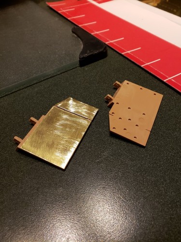Part ready for primer and paint alongside modified plastic part ready for brass.jpg