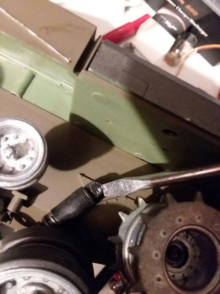 Less bad picture 2.  Screwdriver acts as finger tip as my fingers are a bit on the portly side for these tanks...